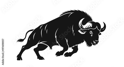 Powerful bull silhouette charging with strength and determination.