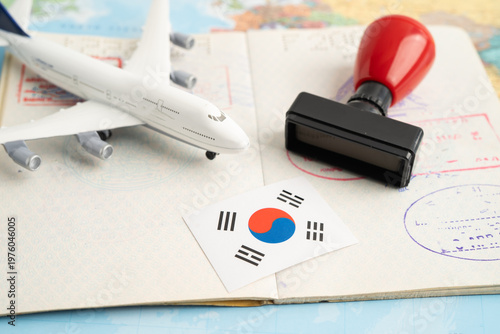 South Korea passport with approved stamp on document for tourism to immigration at airport in country.