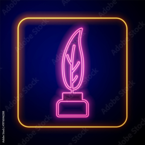Glowing neon Feather and inkwell icon isolated on black background. Vector