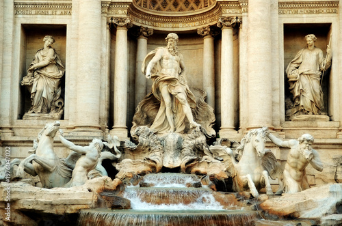 Iconic baroque fountain sculpture with flowing water and classical marble figures