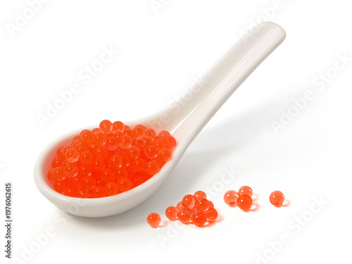 Quadro su tela Salmon roe in spoon isolated on white background