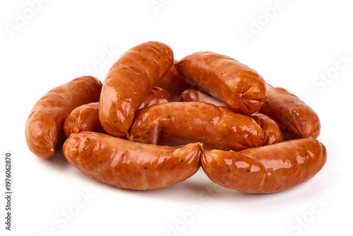 Pork grill sausages with herbs, isolated on white background