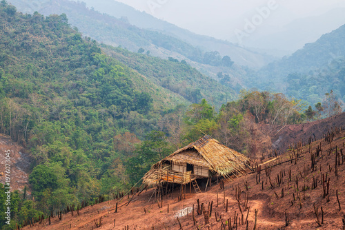 Wooden hut cabin in mountain at Thailand.