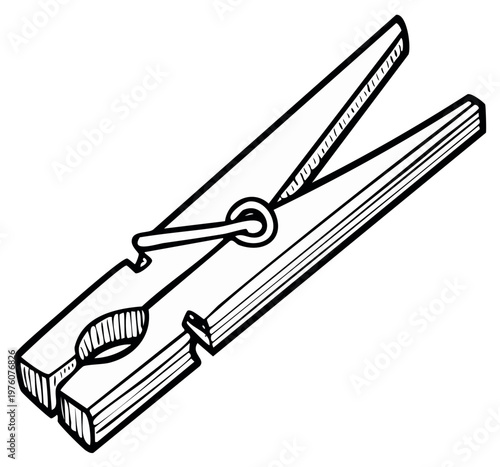 Wooden clothespin with metal spring and open jaws ready to grip fabric for drying laundry outdoors