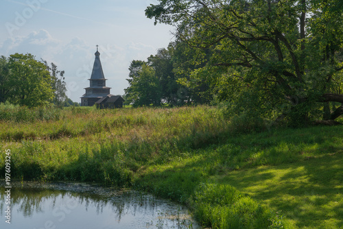 Church of the Assumption from the village of Kooritsko in the Vitoslavlitsi open-air Museum of Folk Wooden Architecture on a sunny summer day, Veliky Novgorod, Russia