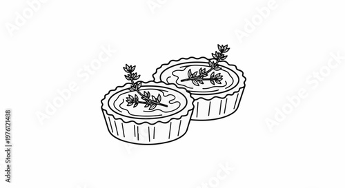 Two small tarts topped with delicate sprigs of herbs on a white background