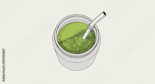 Close-up of a mate gourd filled with yerba mate and a metal straw