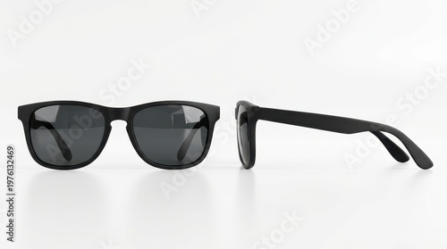 Black sunglasses on white background with one folded