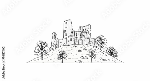 Ruined medieval castle atop a rocky hill with bare trees