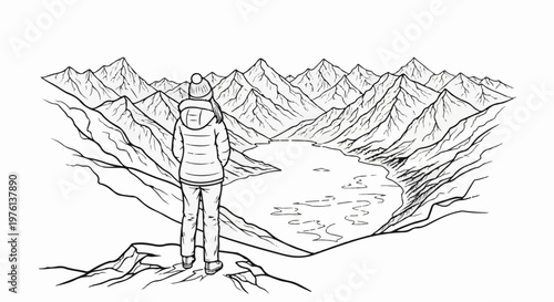 Person in winter coat gazes at vast mountain lake panorama