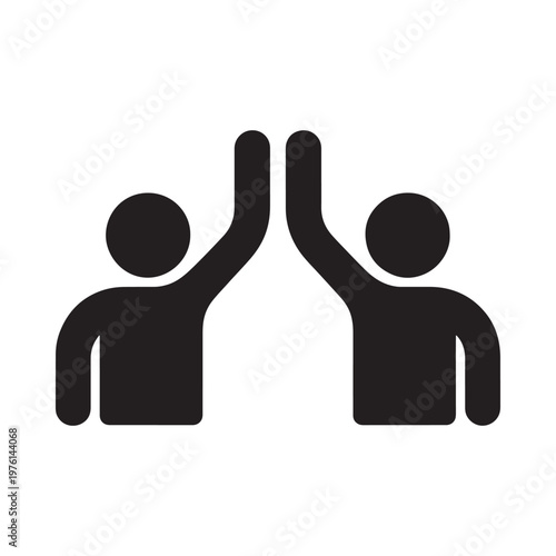 Two silhouetted figures giving each other a high five in celebration