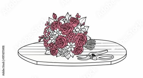 A floral arrangement of roses and smaller flowers sits on a wooden surface with pruning shears