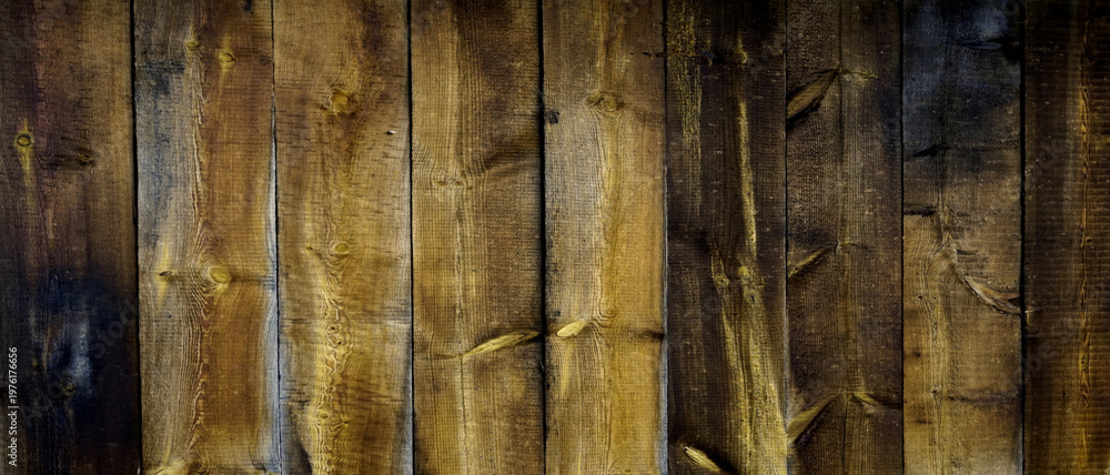 Fototapeta premium Verwittetes braunes Holz als Hintergrund
