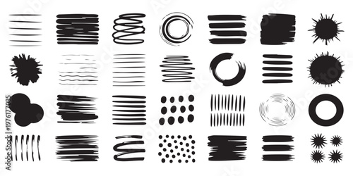 Collection of abstract brush strokes ink splashes and textured elements.