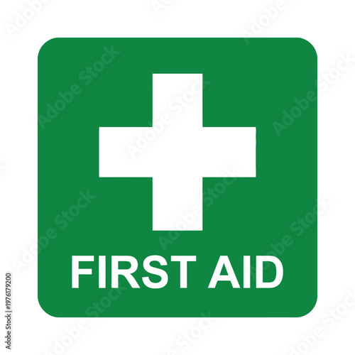 First Aid Sign: A universally recognized green square sign displaying a prominent white cross and the words FIRST AID underneath, signaling immediate access to essential medical assistance.