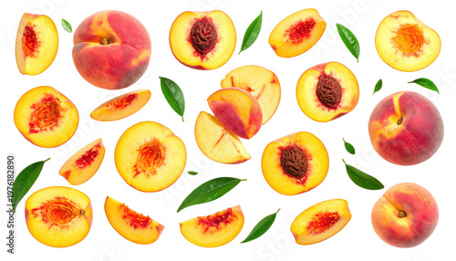 Overhead composition of fresh peaches, whole and sliced, with green leaves, against a black background