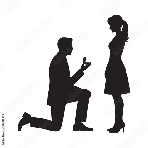 A man proposing marriage to a woman captured in a striking silhouette