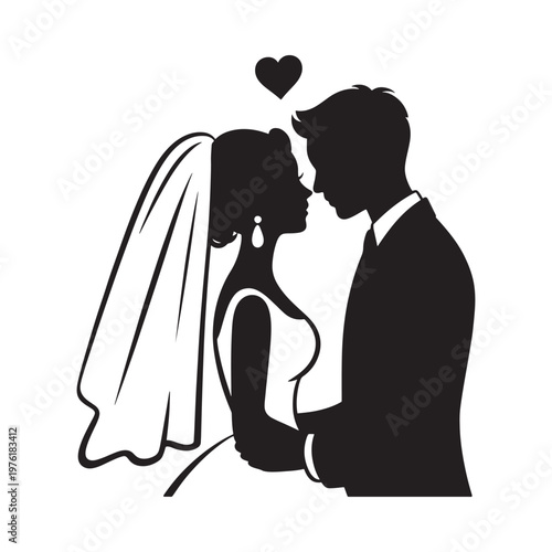 Silhouetted wedding couple embracing with a heart above their heads