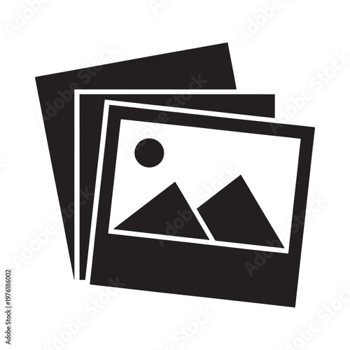 Stack of photographs depicting mountains and a circular element