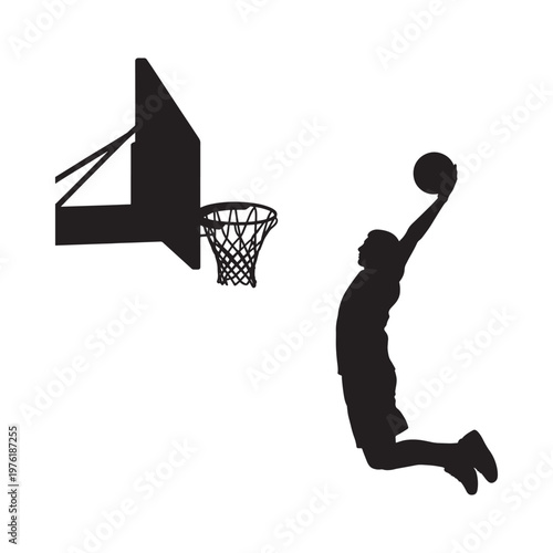 Silhouette of a basketball player in mid air preparing to dunk
