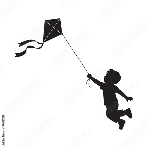 A silhouetted child joyfully flies a diamond shaped kite in the air