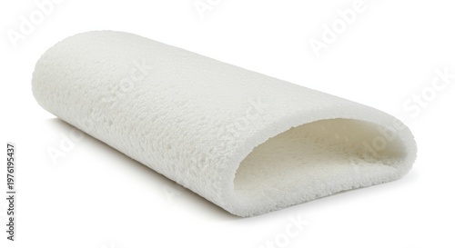 Rolled thin white foam padding sponge with visible porous layers isolated on white background