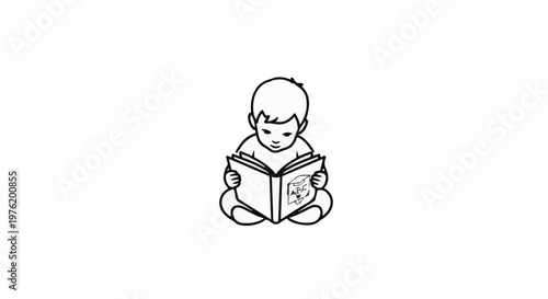 A young child sits cross-legged, engrossed in reading an open book