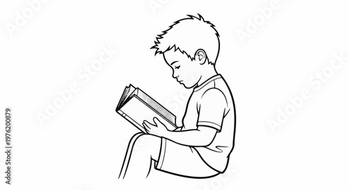 A young boy intently reads a book, engrossed in its pages