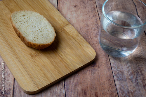 Canvas Print Bread and water simple fasting concept