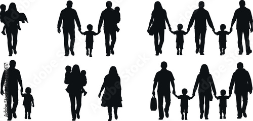 Silhouettes of people walking with children
