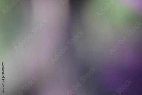 Elegant purple abstract background with soft glowing bokeh and light flow
