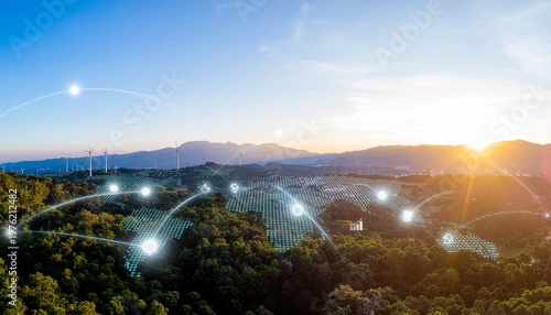 Renewable energy concept with solar panels and wind turbines on green hills with digital network icons at sunrise for sustainable power