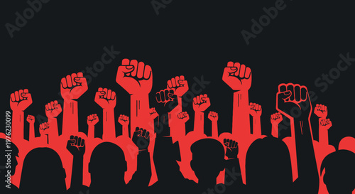 People raising fists in protest demonstration.