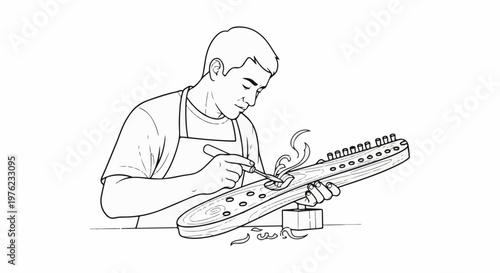 Man meticulously carving intricate details into a wooden object with a tool