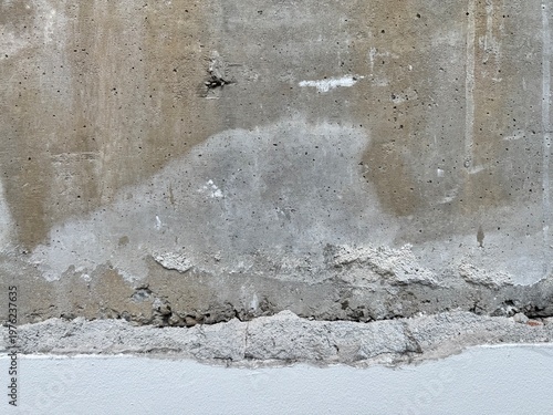 Photography An old wall with the plaster removed, ready for new plastering.