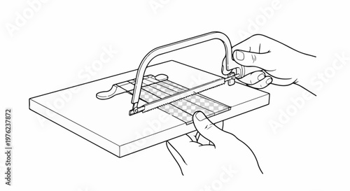 Hands holding a hacksaw to cut a small object on a surface