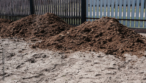 Organic fertilizer, manure piles enrich soil for high crop yield without pesticides or synthetic additives. Natural farming methods boost soil, eco-friendly harvests, and sustainable agriculture
