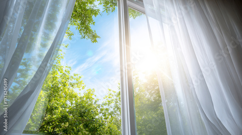 Open window with curtains blowing in gentle breeze, bright sunlight streaming, green trees, blue sky
