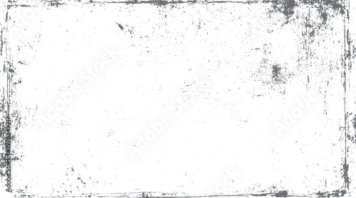 Distressed grunge texture border with scattered speckles and scratches on white background