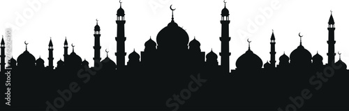 Silhouette of mosque skyline with domes and minarets.