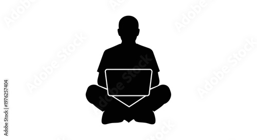 Silhouette of a Person Sitting Cross-legged with Laptop, Representing Remote Work and Digital Connection