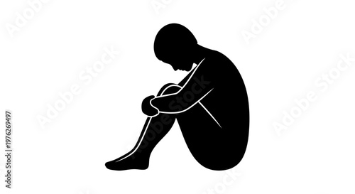 Silhouette of a person in a fetal position, representing loneliness, sadness, and isolation