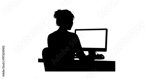 Silhouette of a Woman Working on a Computer with a Mouse and Keyboard