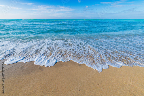 Photography Gentle waves washing ashore at Waikiki Beach
