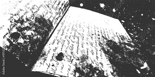 Open book with handwritten script and textured dark background