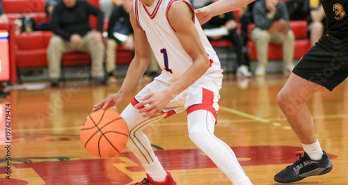 Basketball Players in Action During a Game on the Court