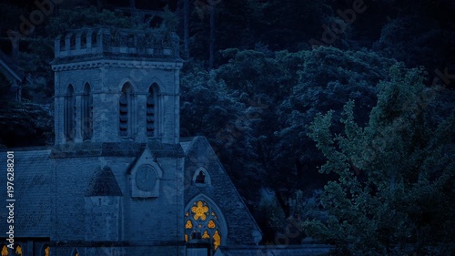 Church In The Evening Buidling With Lit Up Windows