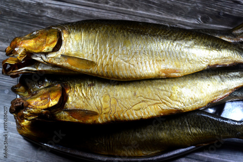 Smoked Herring, known in Egypt and Middle East as Renga, prepared by salting and then cold-smoking herring fish, giving them their characteristic golden-yellow color and distinct smoky flavor