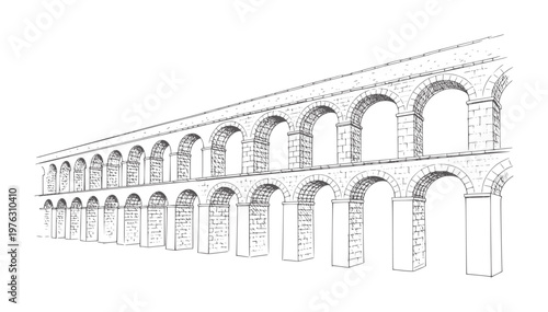 Ancient stone aqueduct with multiple arches stretching into the distance architecture