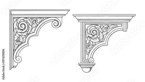 Two ornate architectural corbels with scrollwork and leaf motifs